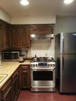 kitchen, equipped, range, oven, refrigerator, dishwasher, microwave, utensils, dishes, tableware, silverware